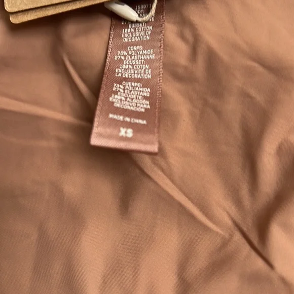 SKIMS Long Sleeve Bodysuit in Tan - Picture 8 of 9